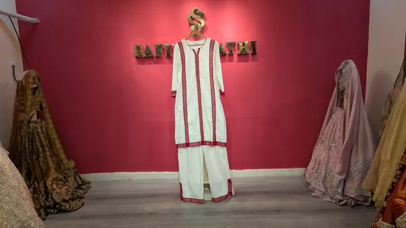 Ivory Linen Kurta Set with Hand-Embroidered Red Detailing