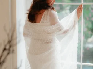 White polka dot net saree with pearl embroidered border